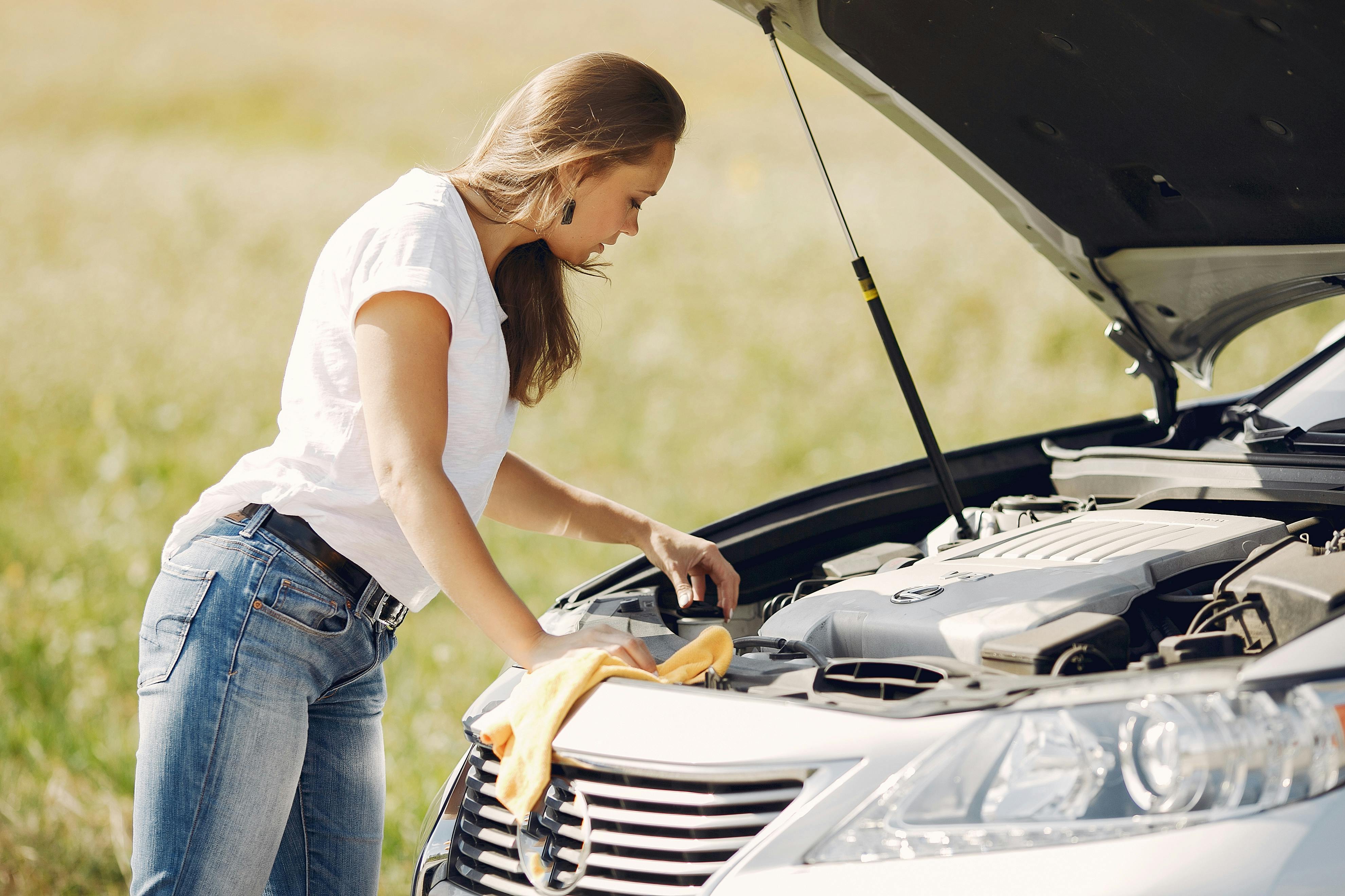 Well-organized car emergency kit with tools, first aid supplies, and safety equipment